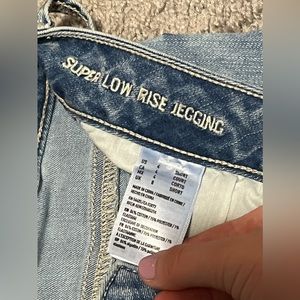 Super low rise distressed American Eagle Jeggings